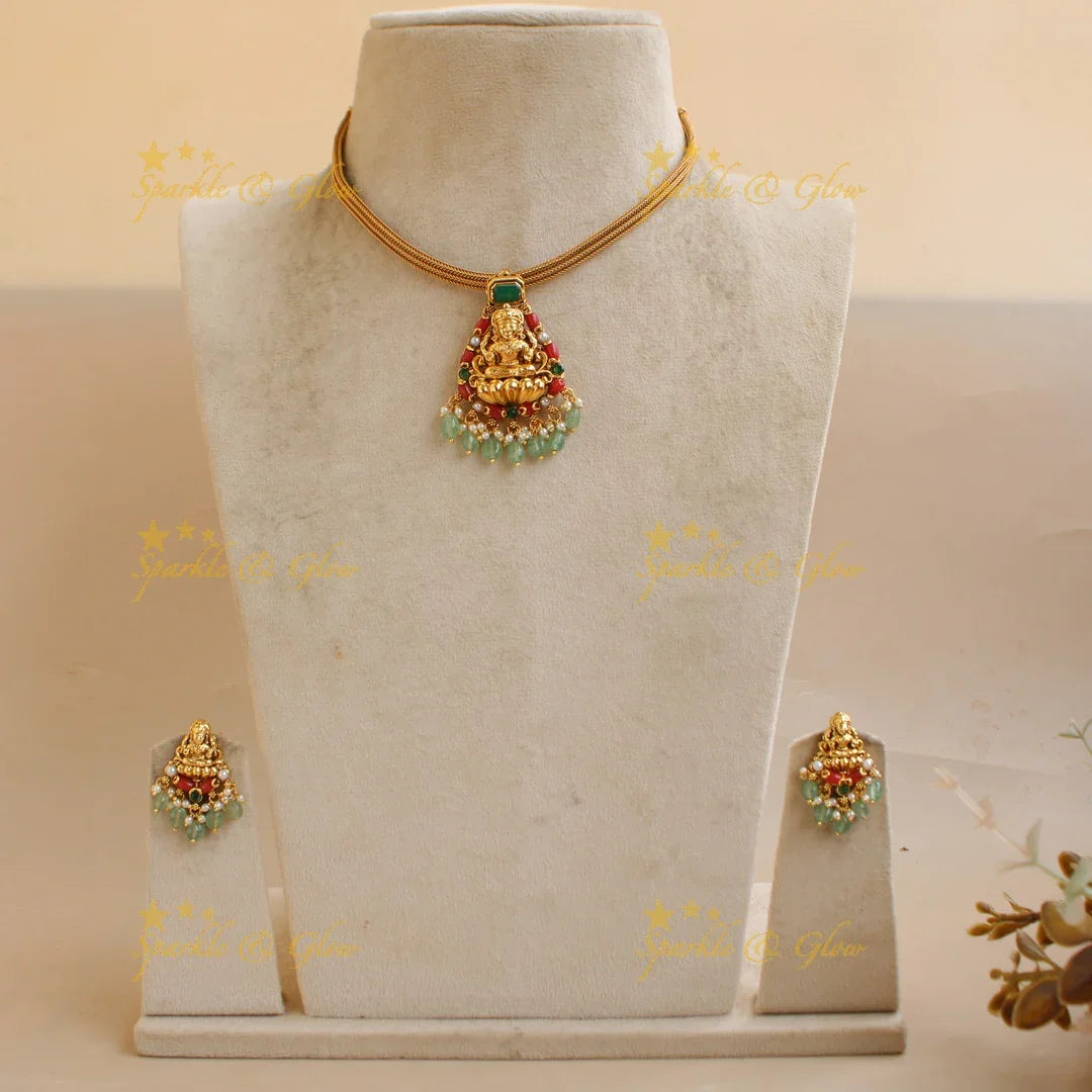 Beautiful Lakshmi carved pendant Chain with coral emerald and mint green beads - Sparkle and Glow