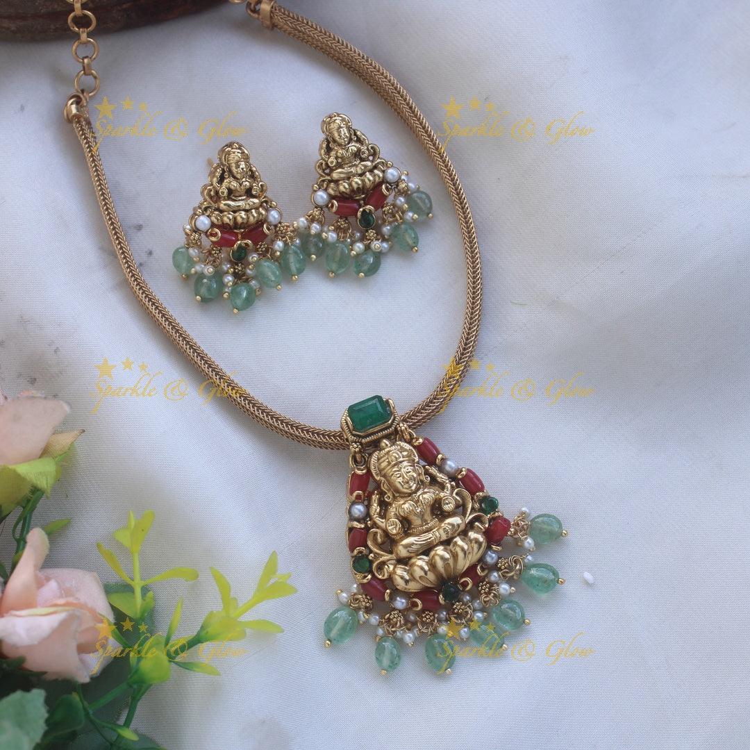 Beautiful Lakshmi carved pendant Chain with coral emerald and mint green beads - Sparkle and Glow
