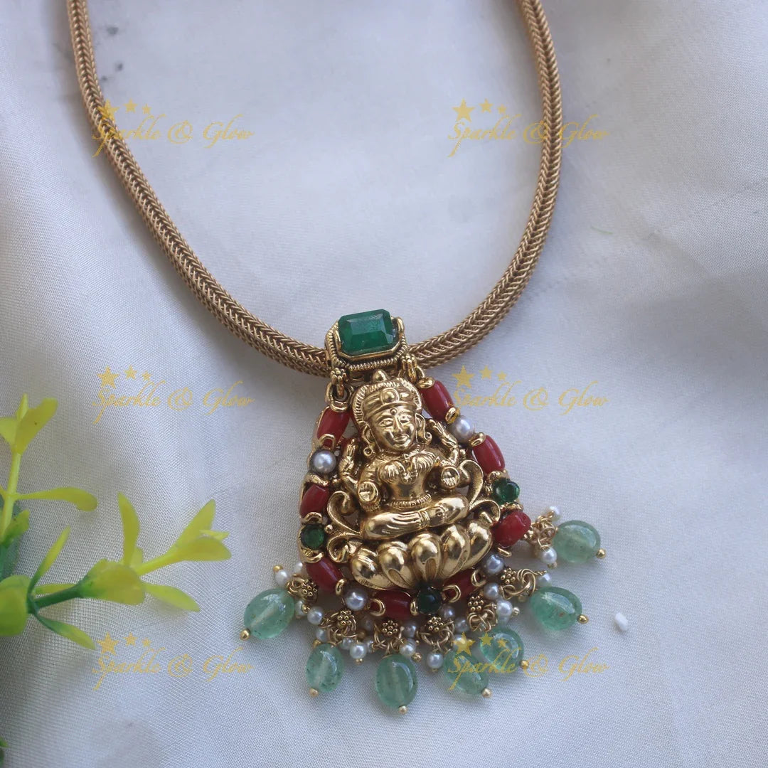 Beautiful Lakshmi carved pendant Chain with coral emerald and mint green beads - Sparkle and Glow