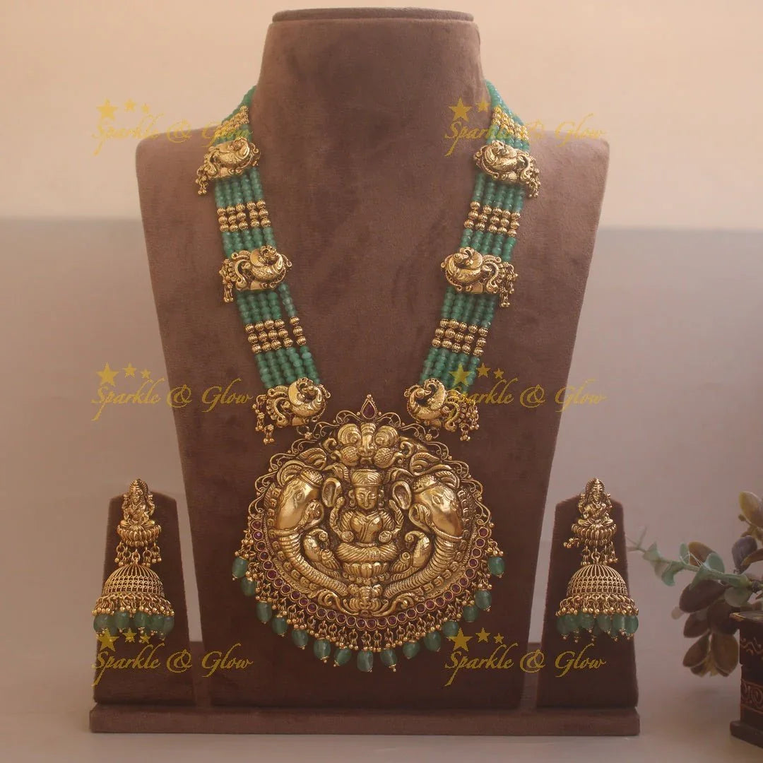 Grand Lakshmi elephant peacock carved pendant haram with ruby and multi layer mint green beads chain - Sparkle and Glow