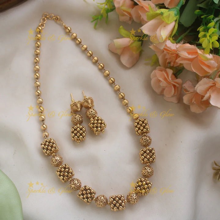 Premium Gold alike polish Floral sqaue and Ball design beaded short necklace - Sparkle and Glow