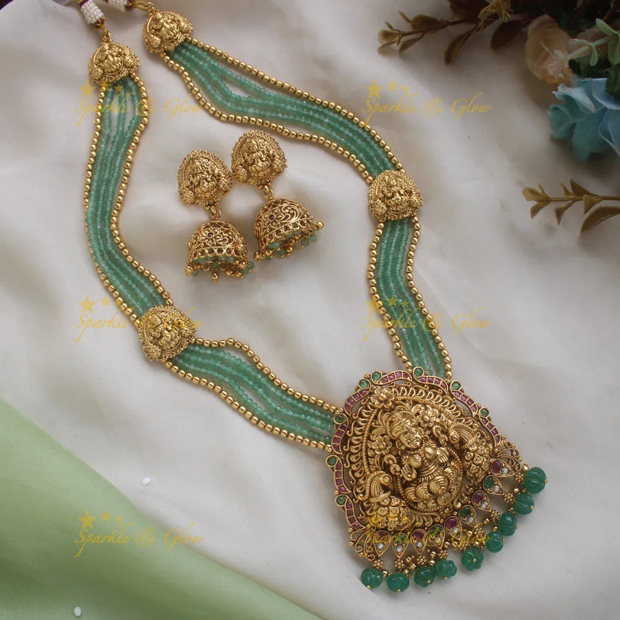 Stunning Lakshmi Peacock carved pendant haram with multi layered Mintgreen and Gold beads chain - Sparkle and Glow