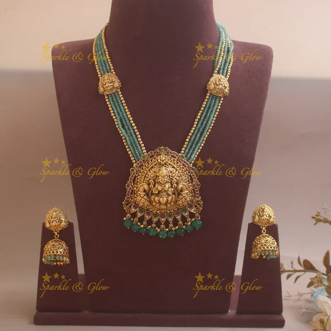 Stunning Lakshmi Peacock carved pendant haram with multi layered Mintgreen and Gold beads chain - Sparkle and Glow