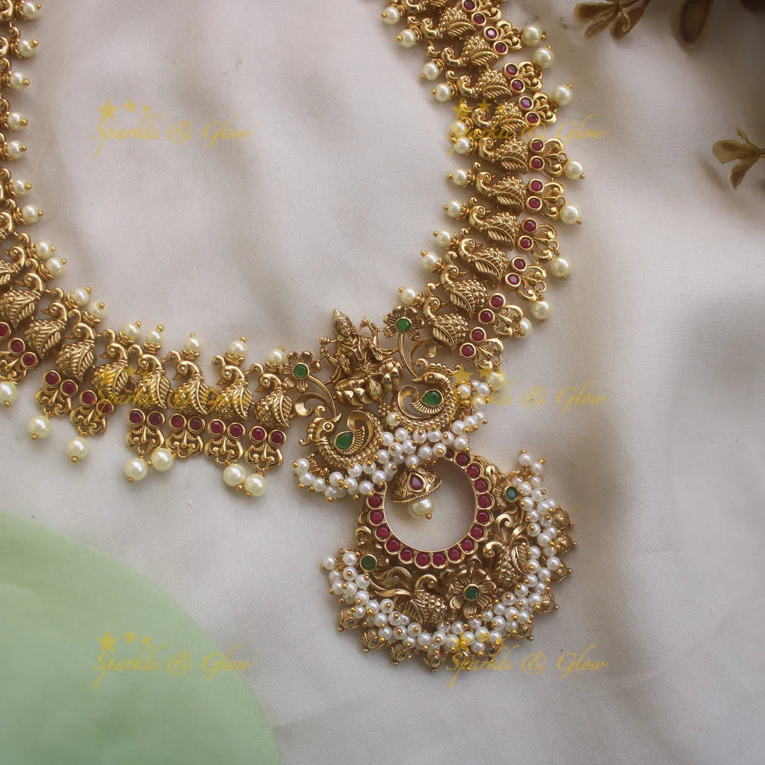 Elegant Idol Lakshmi Peacock carved Haram with Pearl drops - Sparkle and Glow