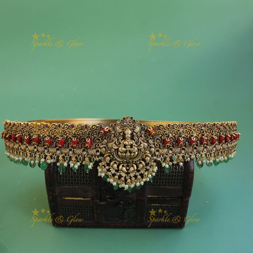 Grand intricate Lakshmi Peacock carved hipbelt with coral pearls and green beads