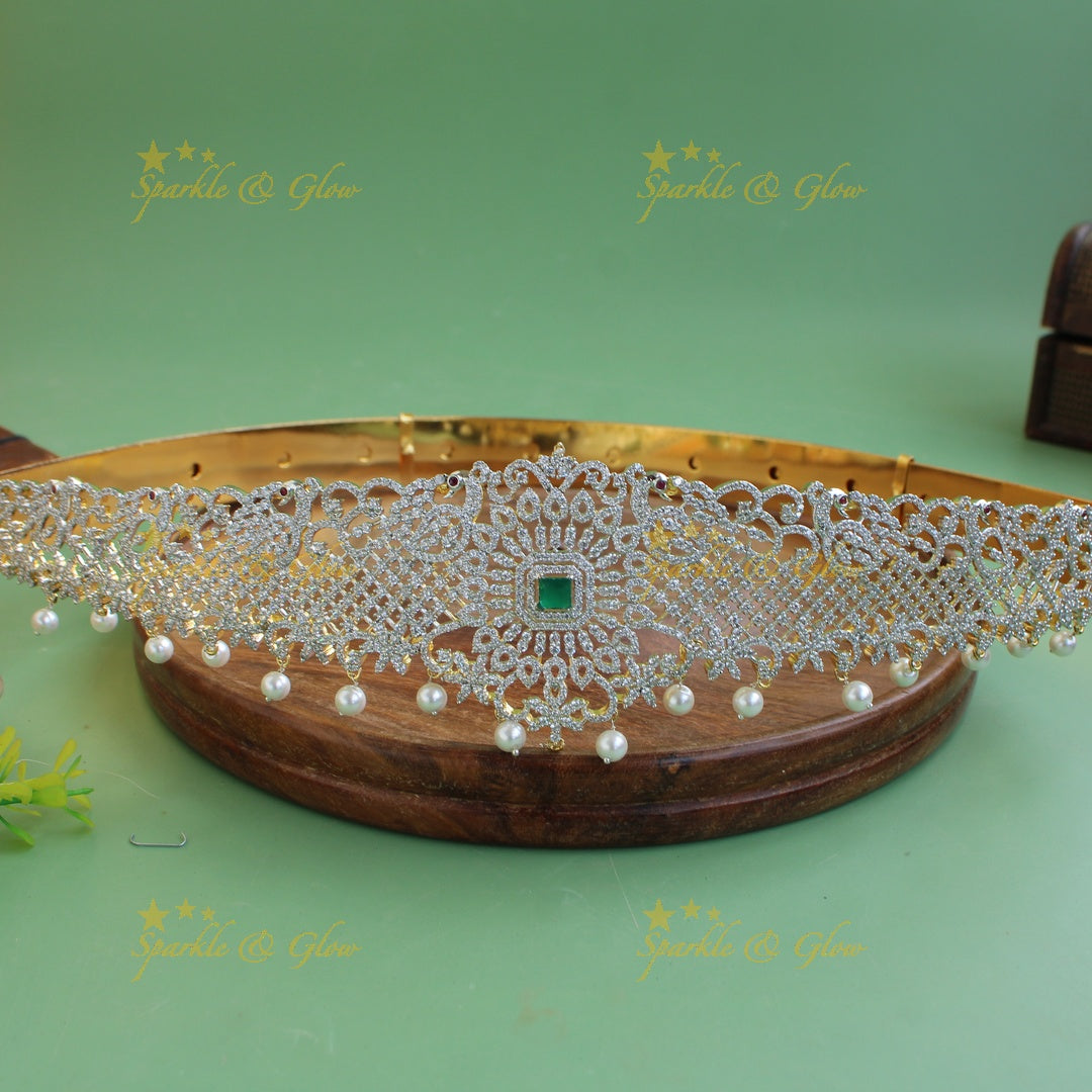 Glittering Floral peacock design American diamond hipbelt with emerald and pearl drops