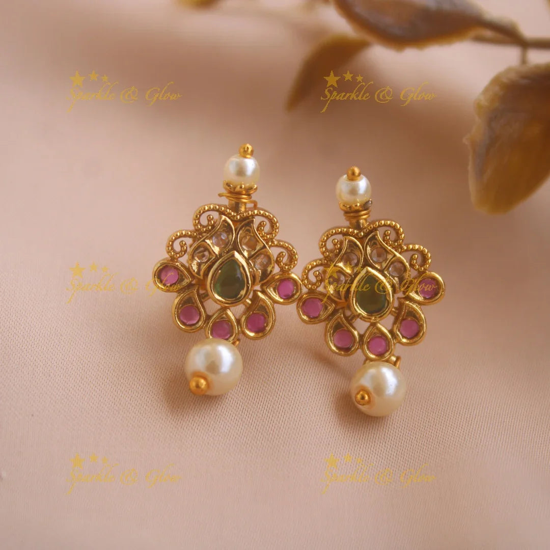 Gold alike Lakshmi coin and floral design AD short necklace with ruby emerald and pearls - Sparkle and Glow