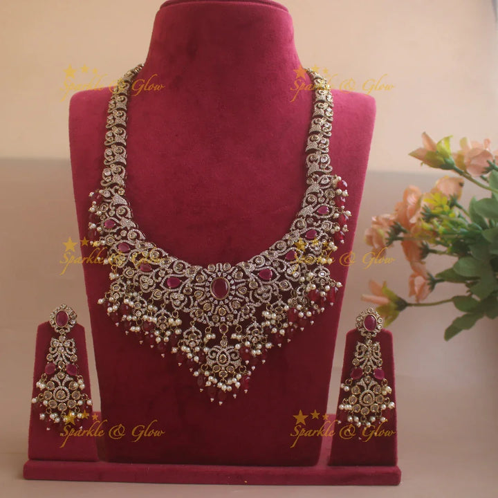 Gorgeous Floral Leaf design victorian AD long necklace with ruby stones pearls and maroon beads - Sparkle and Glow