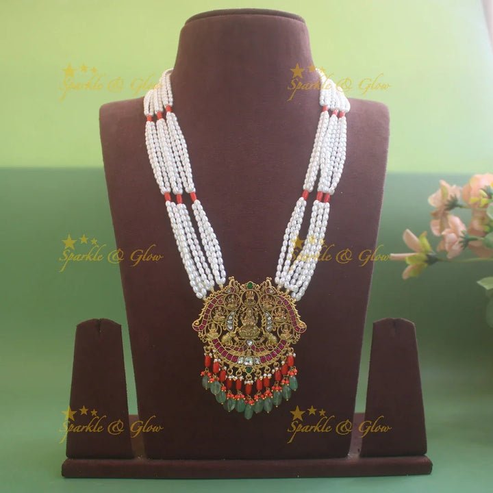 Exquisite Lakshmi Elephant Peacock carved pendant haram with coral multi layer pearl chain and mint green beads - Sparkle and Glow