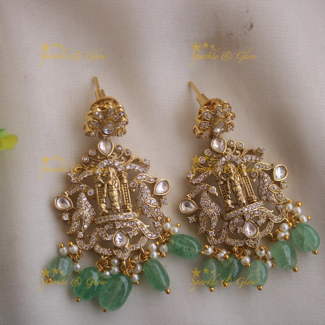 Exclusive Rama Parivar carved pandent multi layer beads haram with jhumuka drops and mint green beads - Sparkle and Glow