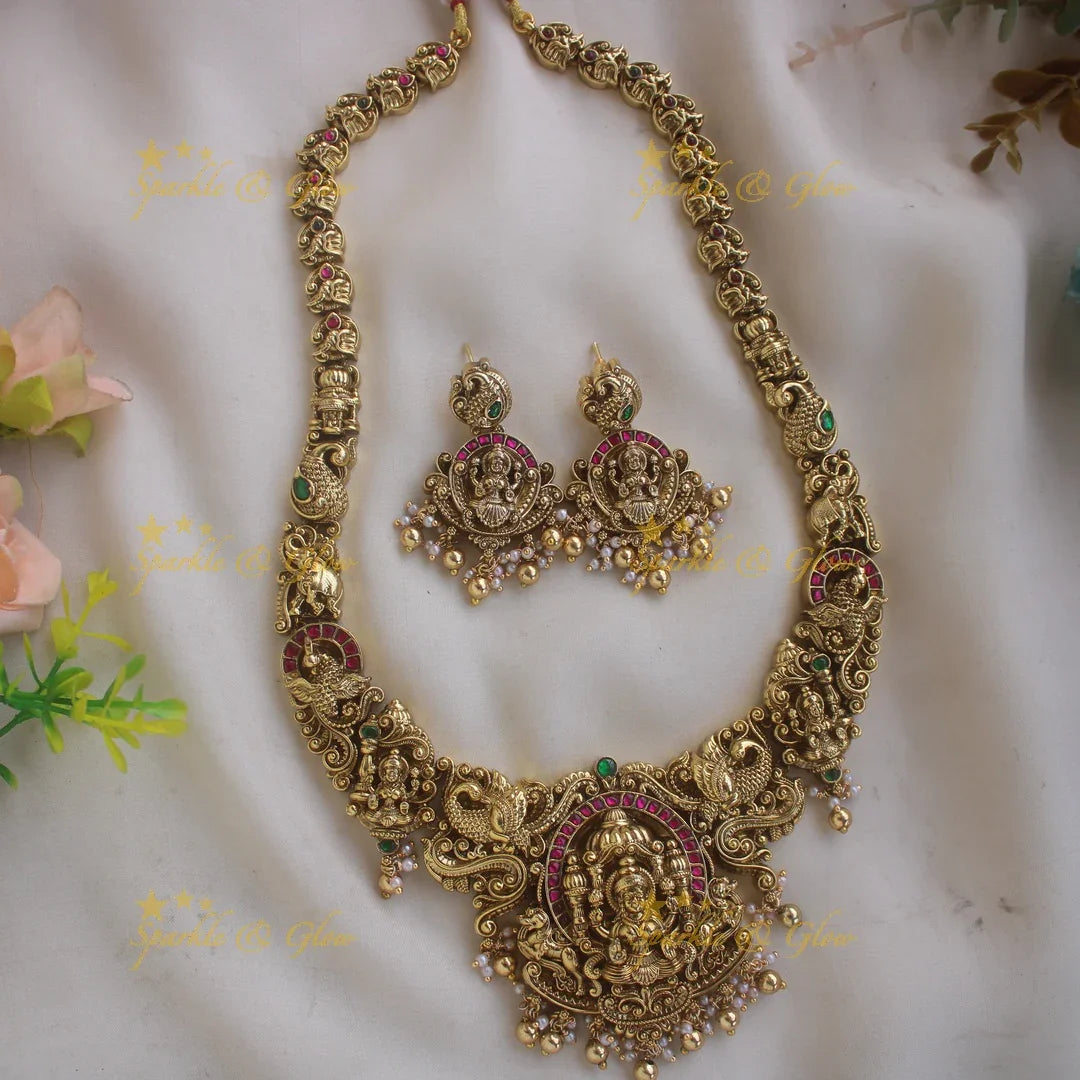 Grand intricate Lakshmi peacock carved jadau long necklace with ruby emerald stones and gold beads - Sparkle and Glow