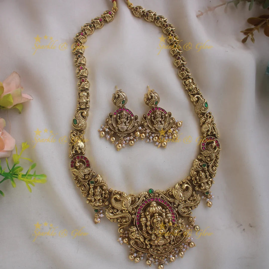 Grand intricate Lakshmi peacock carved jadau long necklace with ruby emerald stones and gold beads - Sparkle and Glow