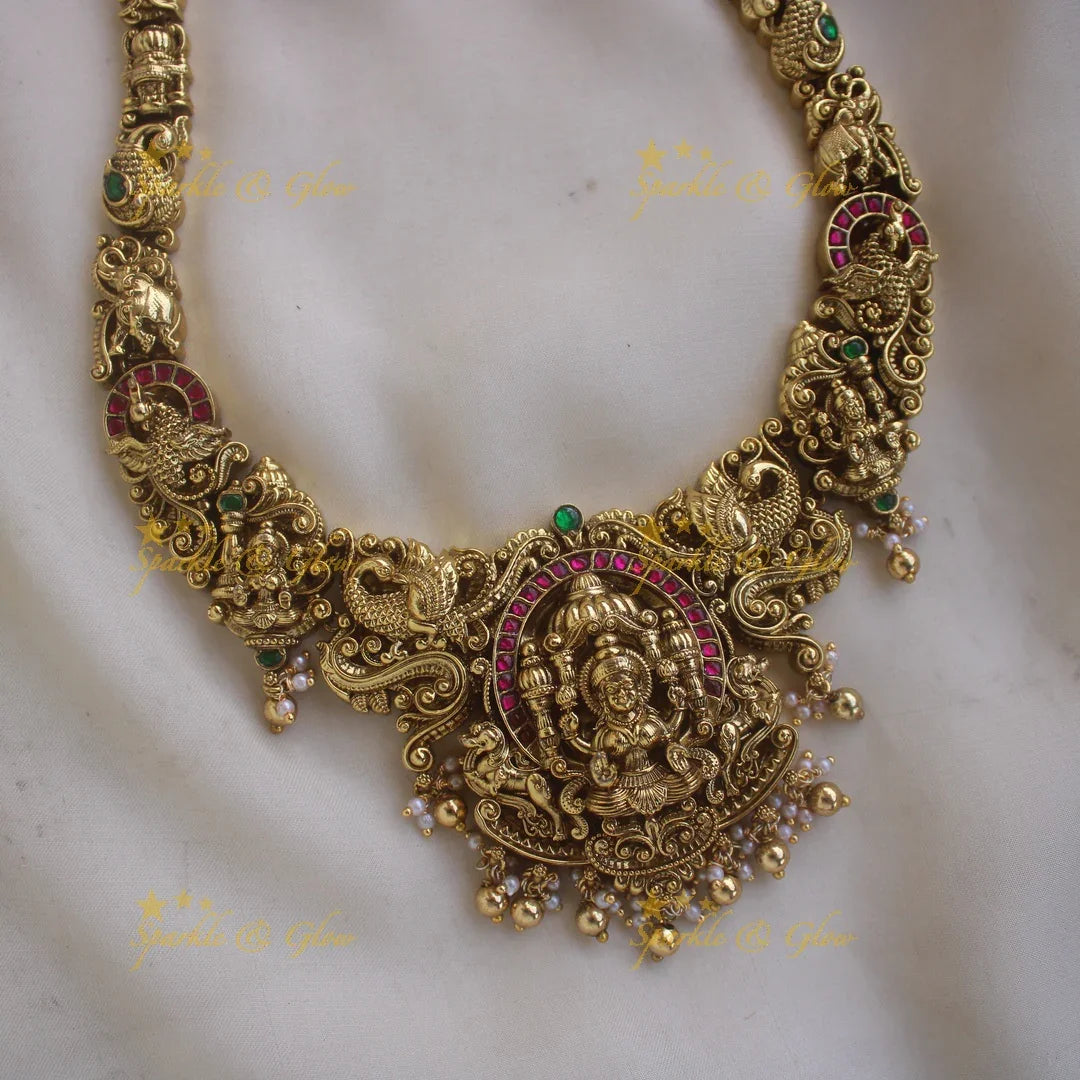 Grand intricate Lakshmi peacock carved jadau long necklace with ruby emerald stones and gold beads - Sparkle and Glow
