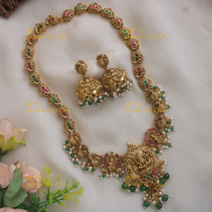 Gorgeous Lakshmi peacock carved jadau long necklace with pearls and green beads - Sparkle and Glow