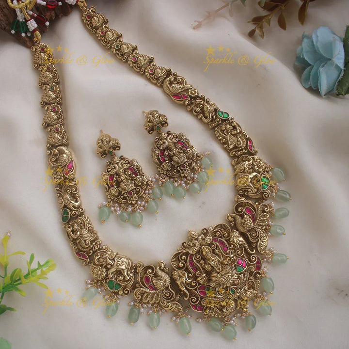 Exclusive Lakshmi peacock elephant carved jadau long necklace with pearls and mint green beads - Sparkle and Glow