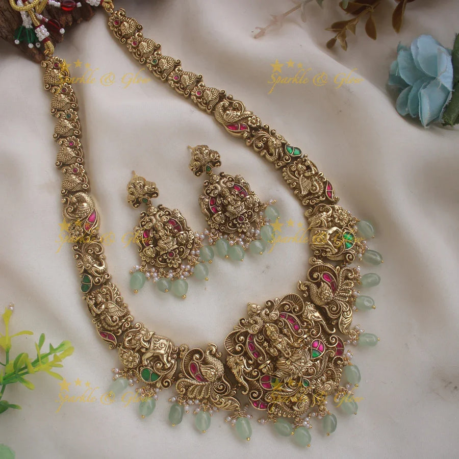 Exclusive Lakshmi peacock elephant carved jadau long necklace with pearls and mint green beads - Sparkle and Glow