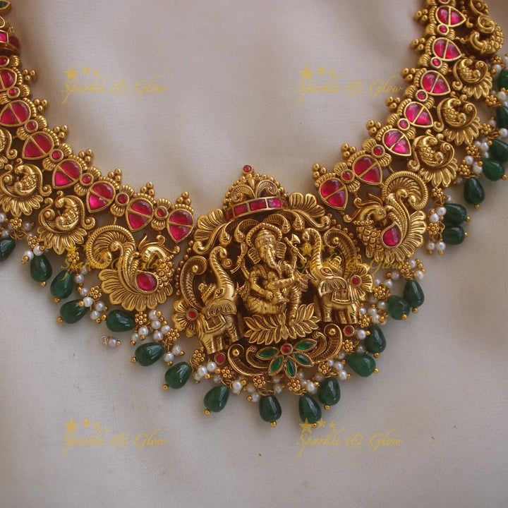 Beautiful Ganesha peacock elephant carved jadau short necklace with pearls and green beads - Sparkle and Glow
