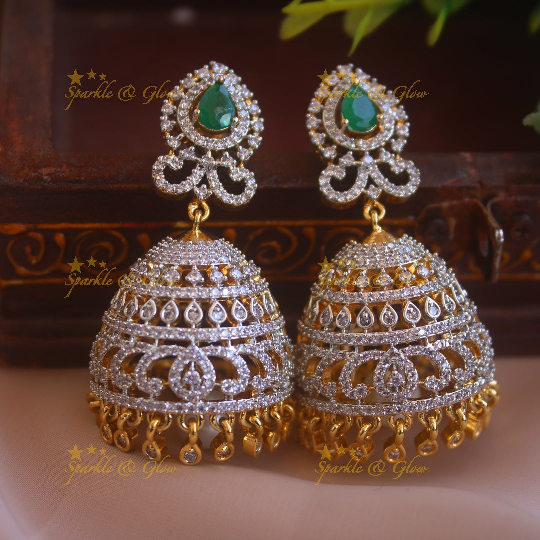 Grand intricate design American diamond jumukas with emerald and stone drops