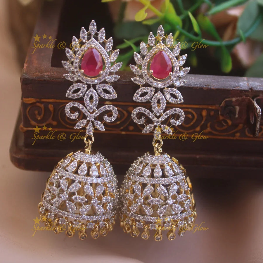 Sparkling Floral and leaf design American diamond jumukas with emerald and stone drops - Sparkle and Glow
