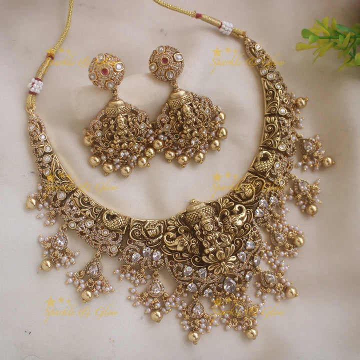 Beatiful Lakshmi elephant carved short necklace with CZ stones pearls and gold beads - Sparkle and Glow