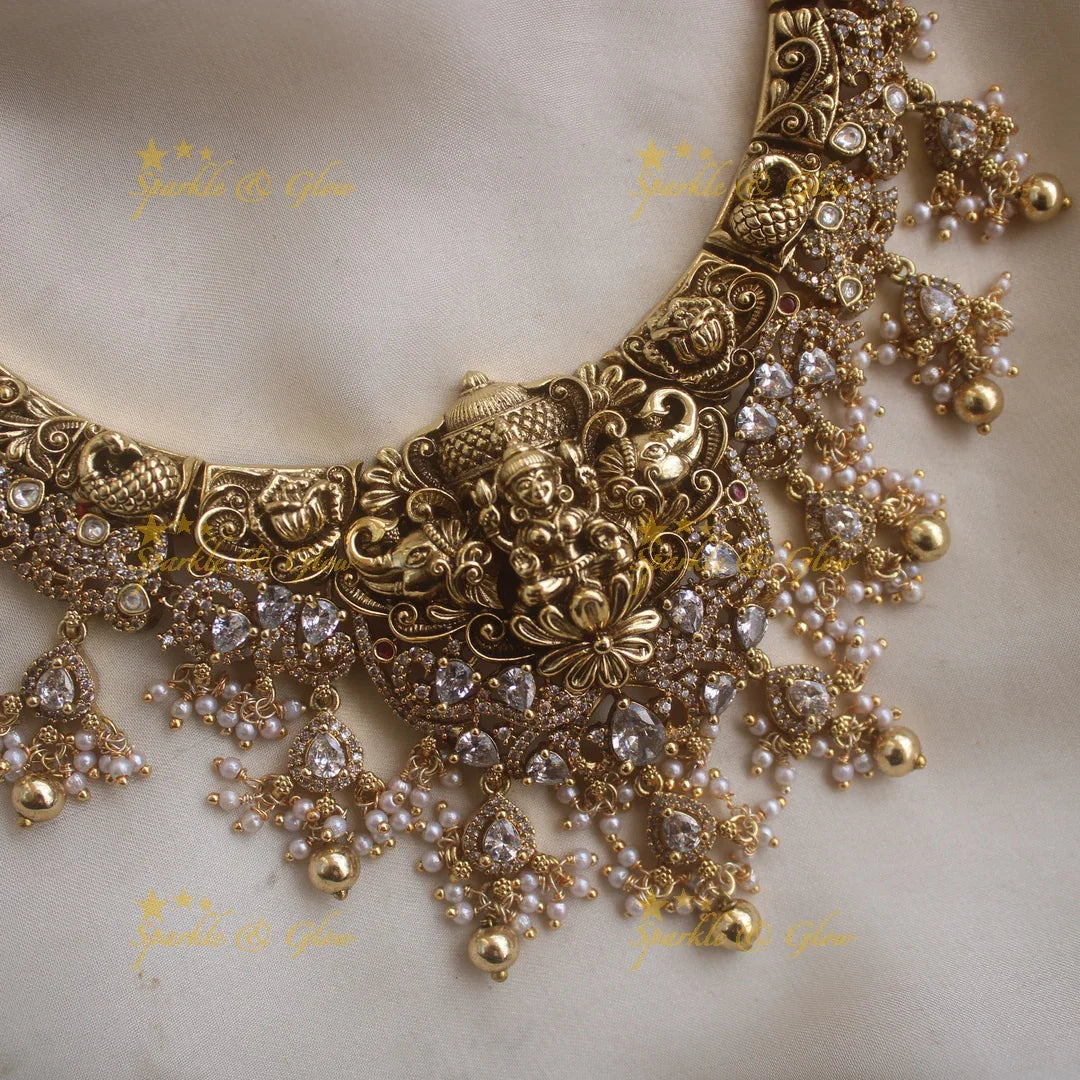 Beatiful Lakshmi elephant carved short necklace with CZ stones pearls and gold beads - Sparkle and Glow