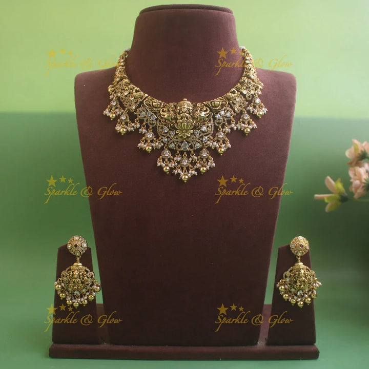 Beatiful Lakshmi elephant carved short necklace with CZ stones pearls and gold beads - Sparkle and Glow