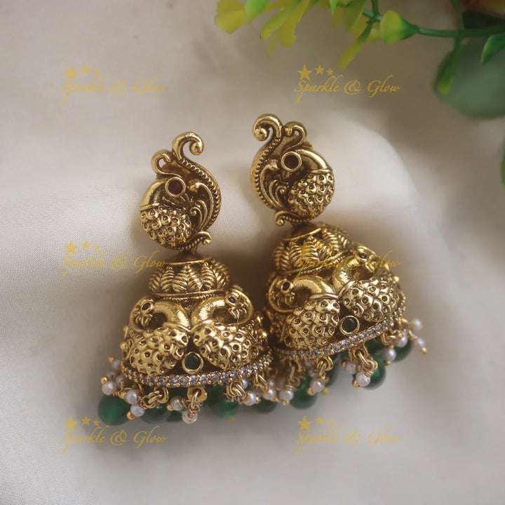 Stunning Lakshmi Peacock carved long necklace with CZ stones and green beads - Sparkle and Glow