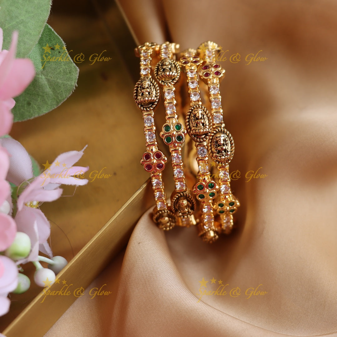 Beautiful Lakshmi floral bangles with multi colour stones , two pairs , 2.4