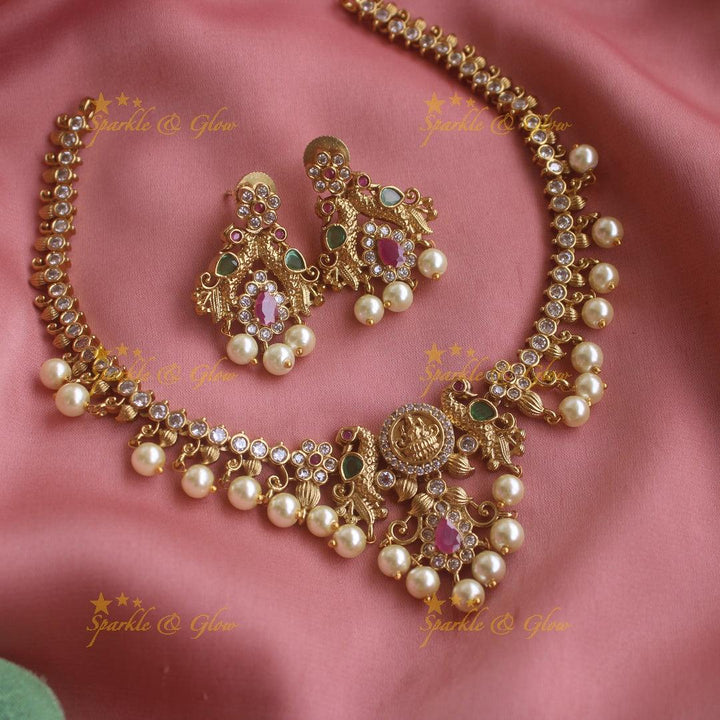 Beautiful Lakshmi peacock design short necklace with CZ stones and pearl drops - Sparkle and Glow