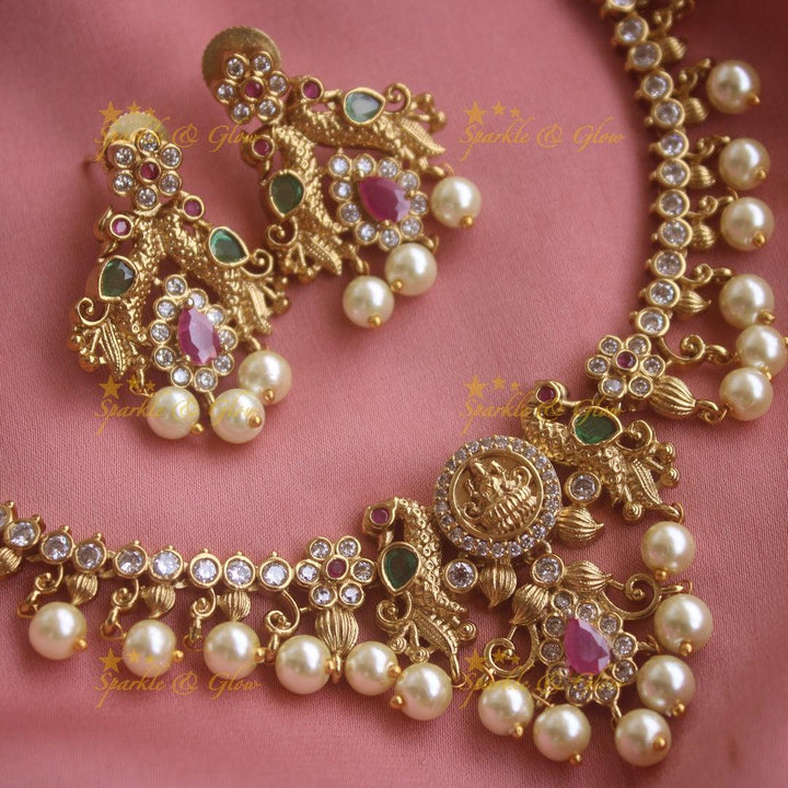 Beautiful Lakshmi peacock design short necklace with CZ stones and pearl drops - Sparkle and Glow