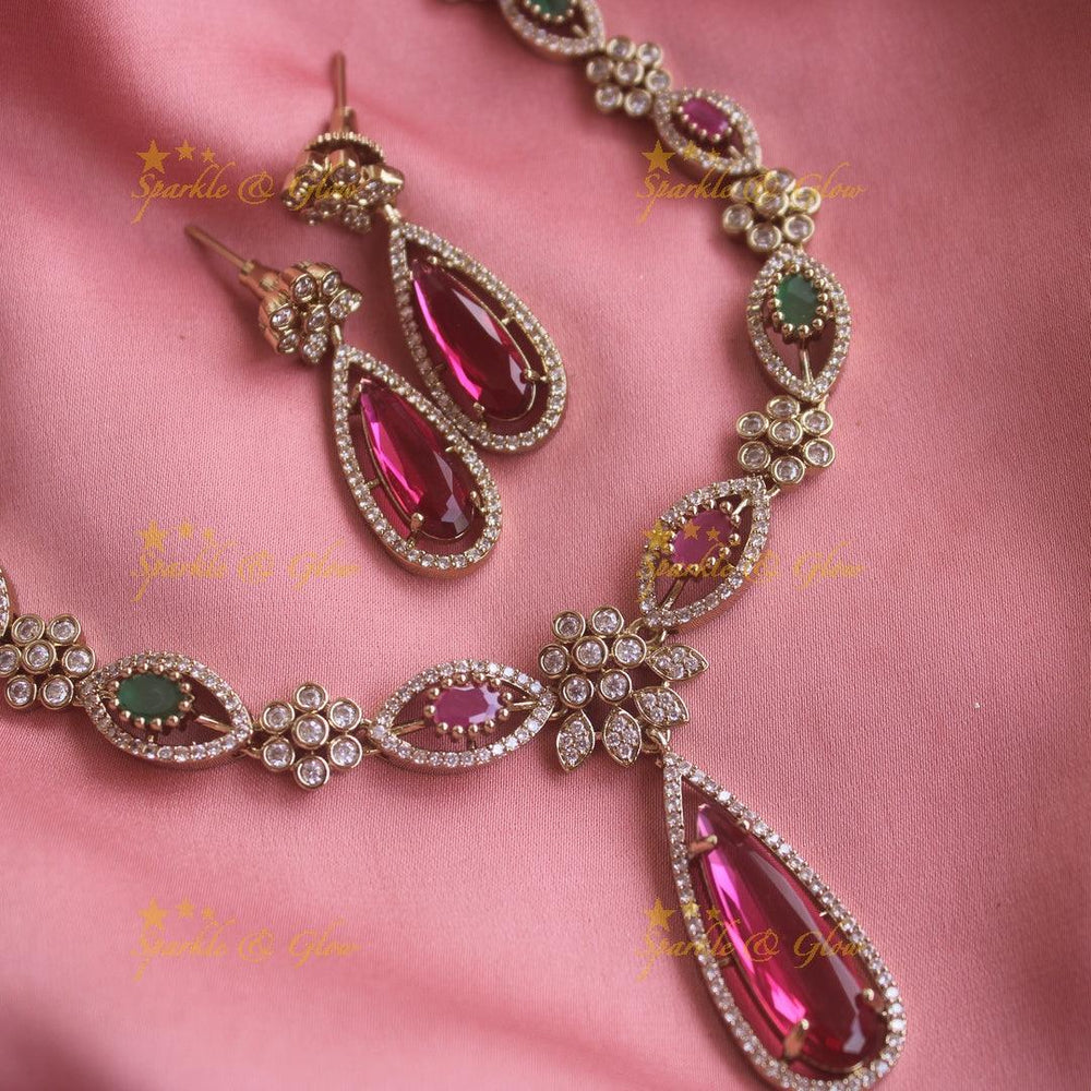 Statement Floral and oval stone drop AD short necklace with ruby and emeralds - Sparkle and Glow