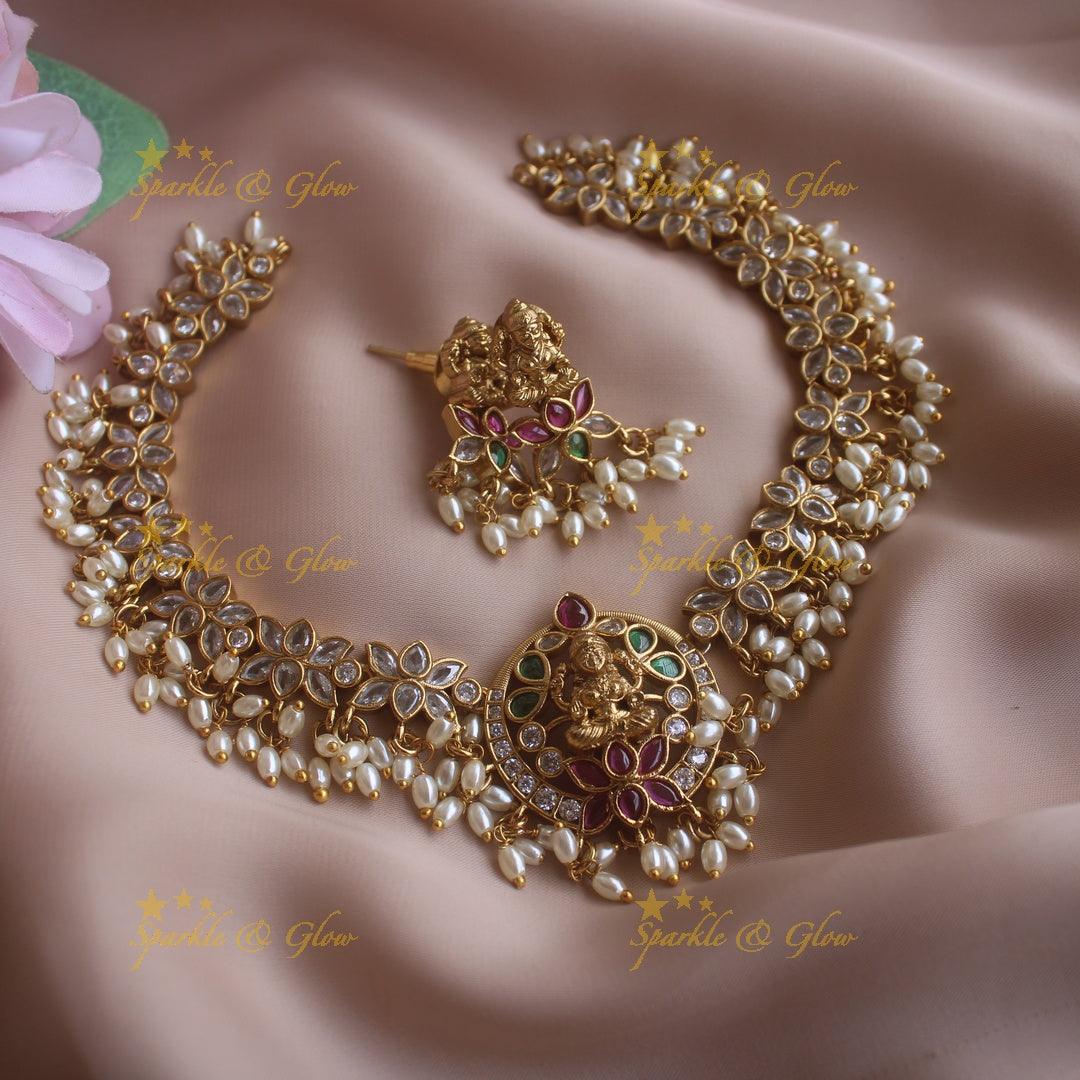 Statement Lakshmi lotus design short necklace with ruby emerald CZ stones and rice pearls - Sparkle and Glow