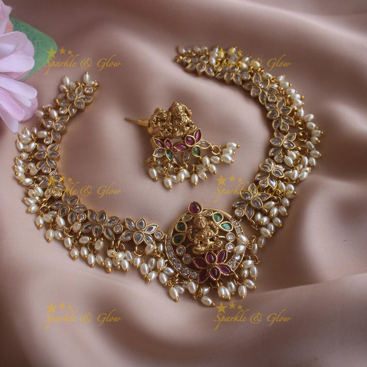 Statement Lakshmi lotus design short necklace with ruby emerald CZ stones and rice pearls - Sparkle and Glow