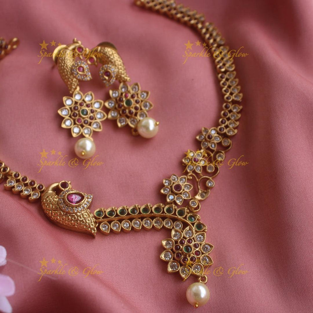 Beautiful Peacock and floral design short necklace with CZ stones and pearl drop - Sparkle and Glow