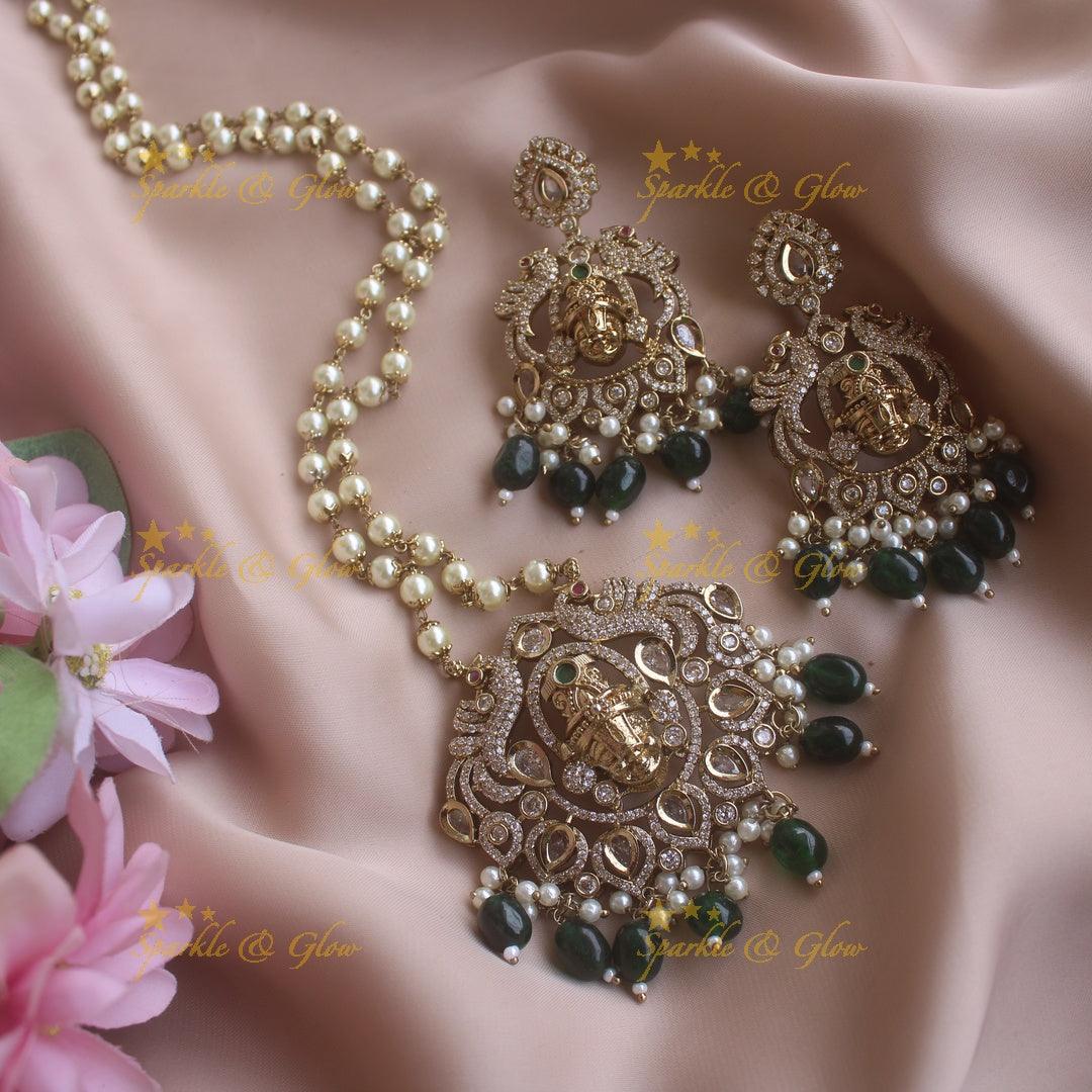Beautiful Balaji and Peacock carved pendant Victorian AD haram with pearl chain and green beads - Sparkle and Glow