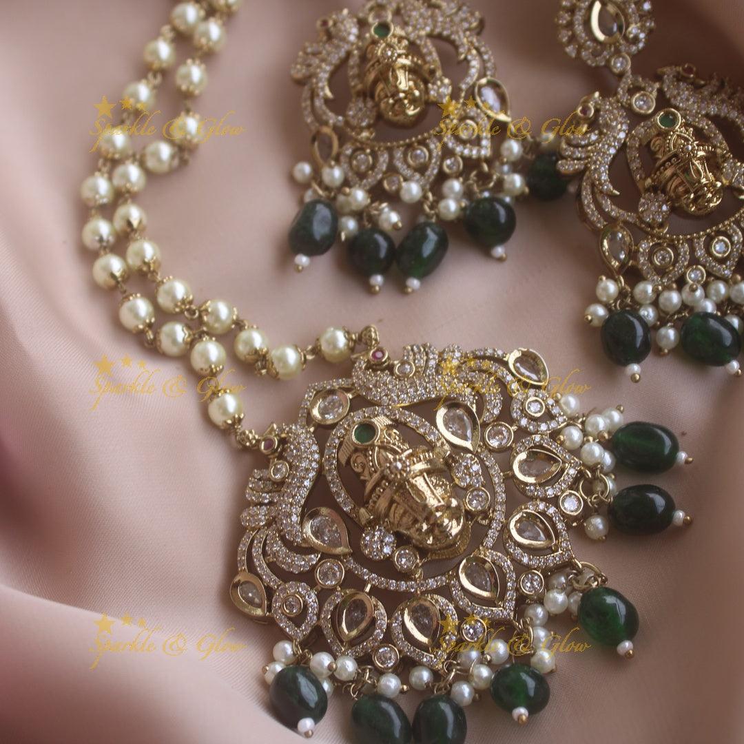 Beautiful Balaji and Peacock carved pendant Victorian AD haram with pearl chain and green beads - Sparkle and Glow
