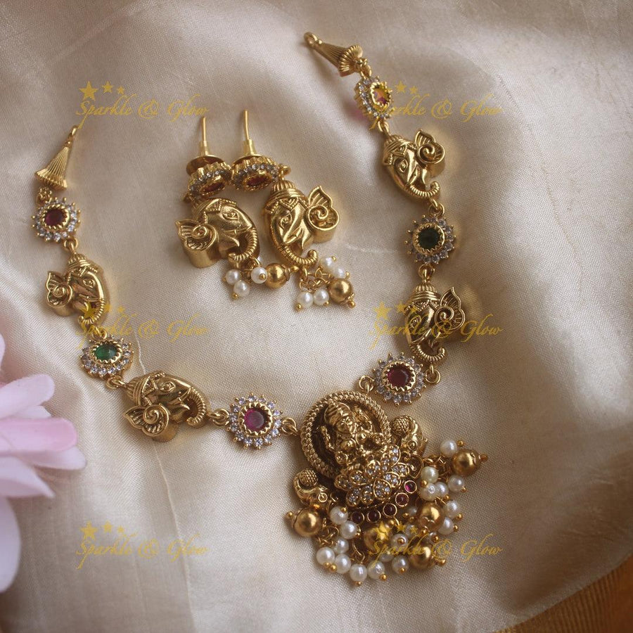 Beautiful Lakshmi ganesha carved short necklace with ruby emerald pearls and gold beads - Sparkle and Glow