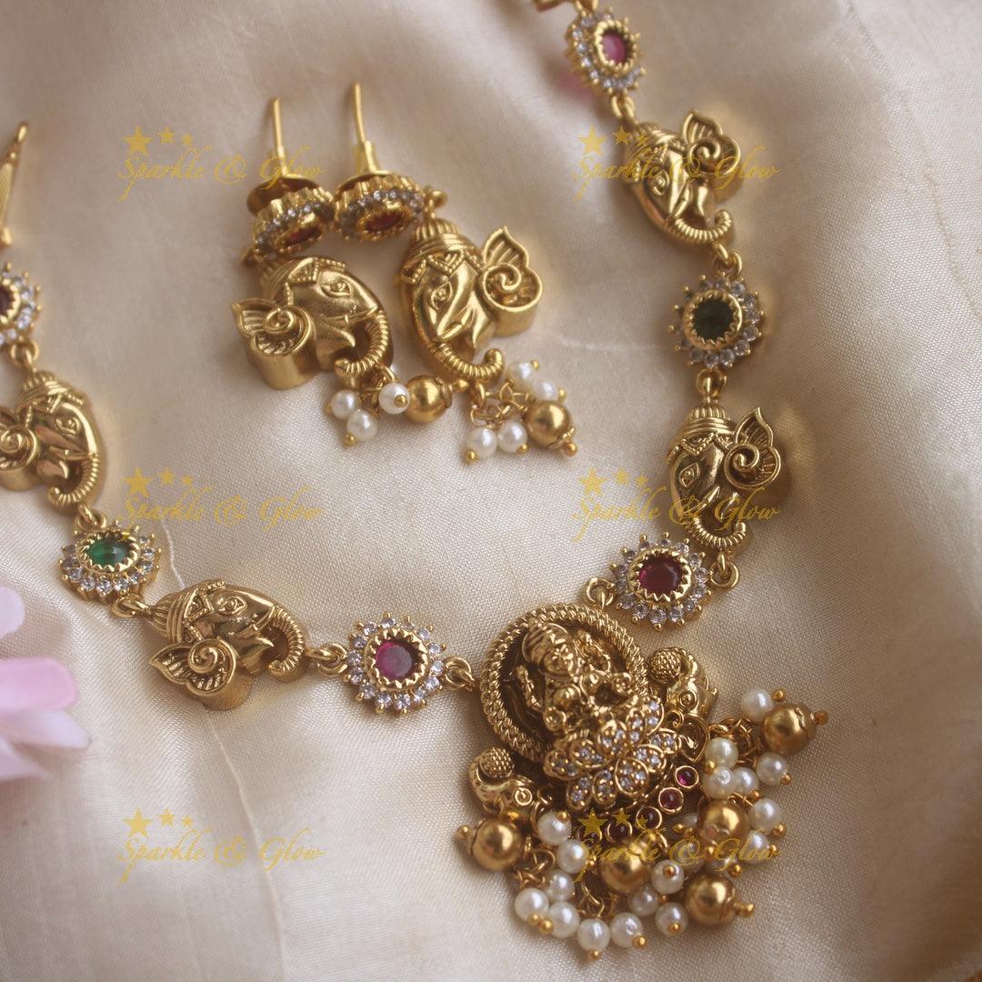 Beautiful Lakshmi ganesha carved short necklace with ruby emerald pearls and gold beads - Sparkle and Glow