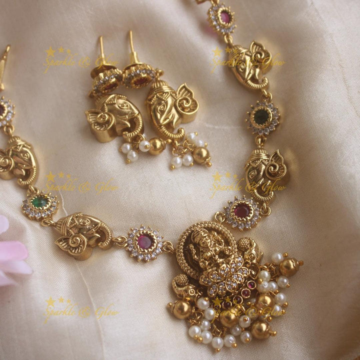 Beautiful Lakshmi ganesha carved short necklace with ruby emerald pearls and gold beads - Sparkle and Glow