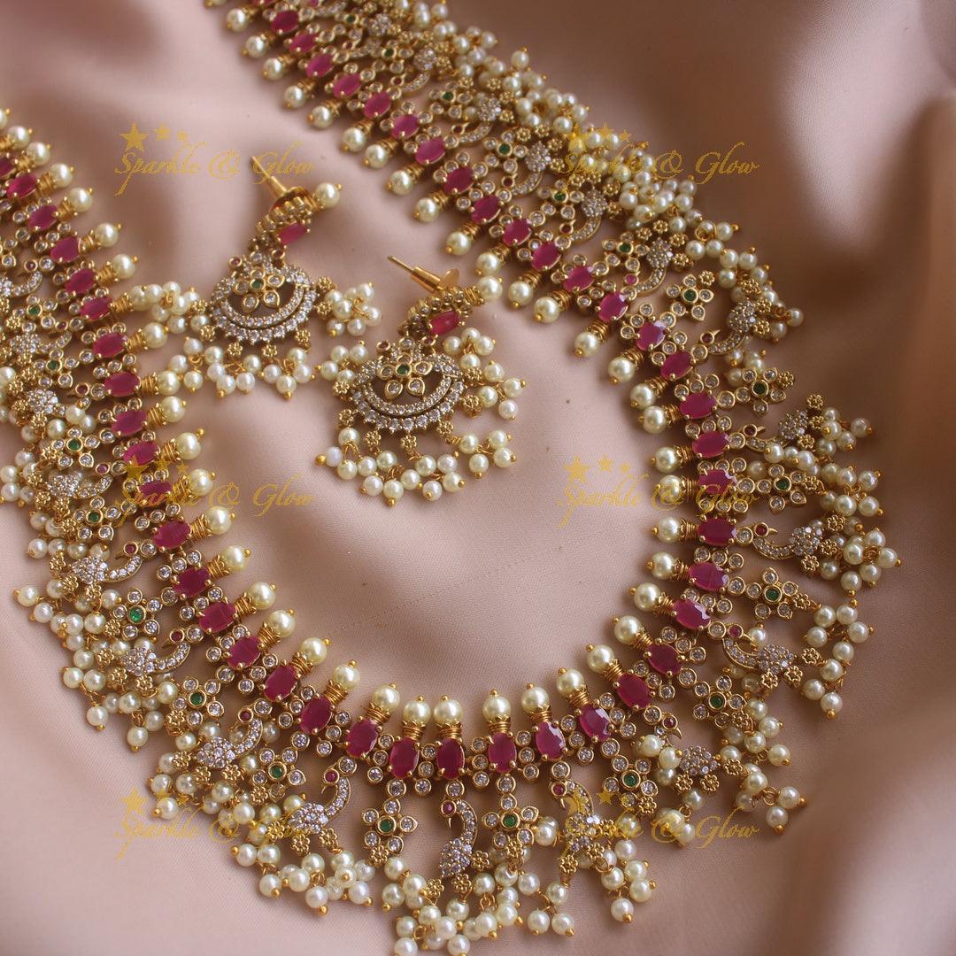 Gorgeous Peacock and floral gutta pusalu long necklace with ruby and CZ stones - Sparkle and Glow