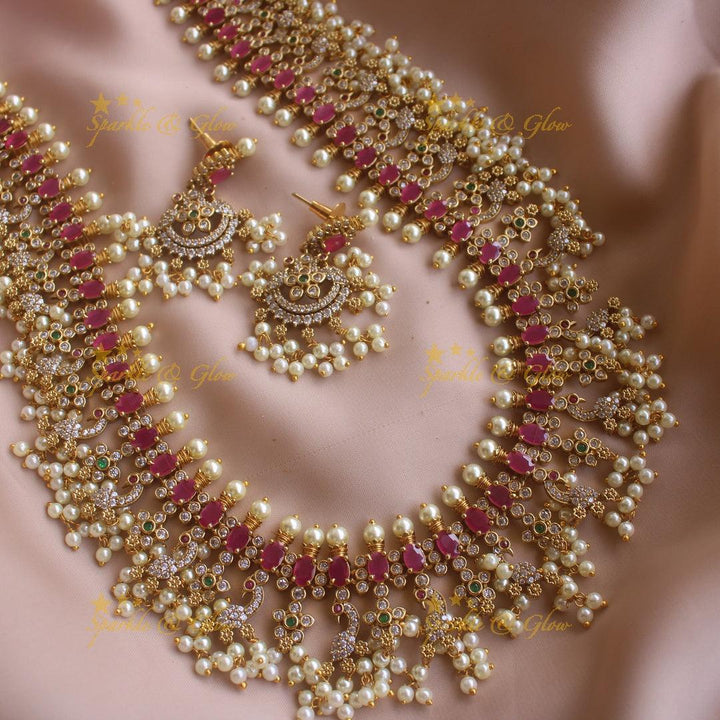Gorgeous Peacock and floral gutta pusalu long necklace with ruby and CZ stones - Sparkle and Glow