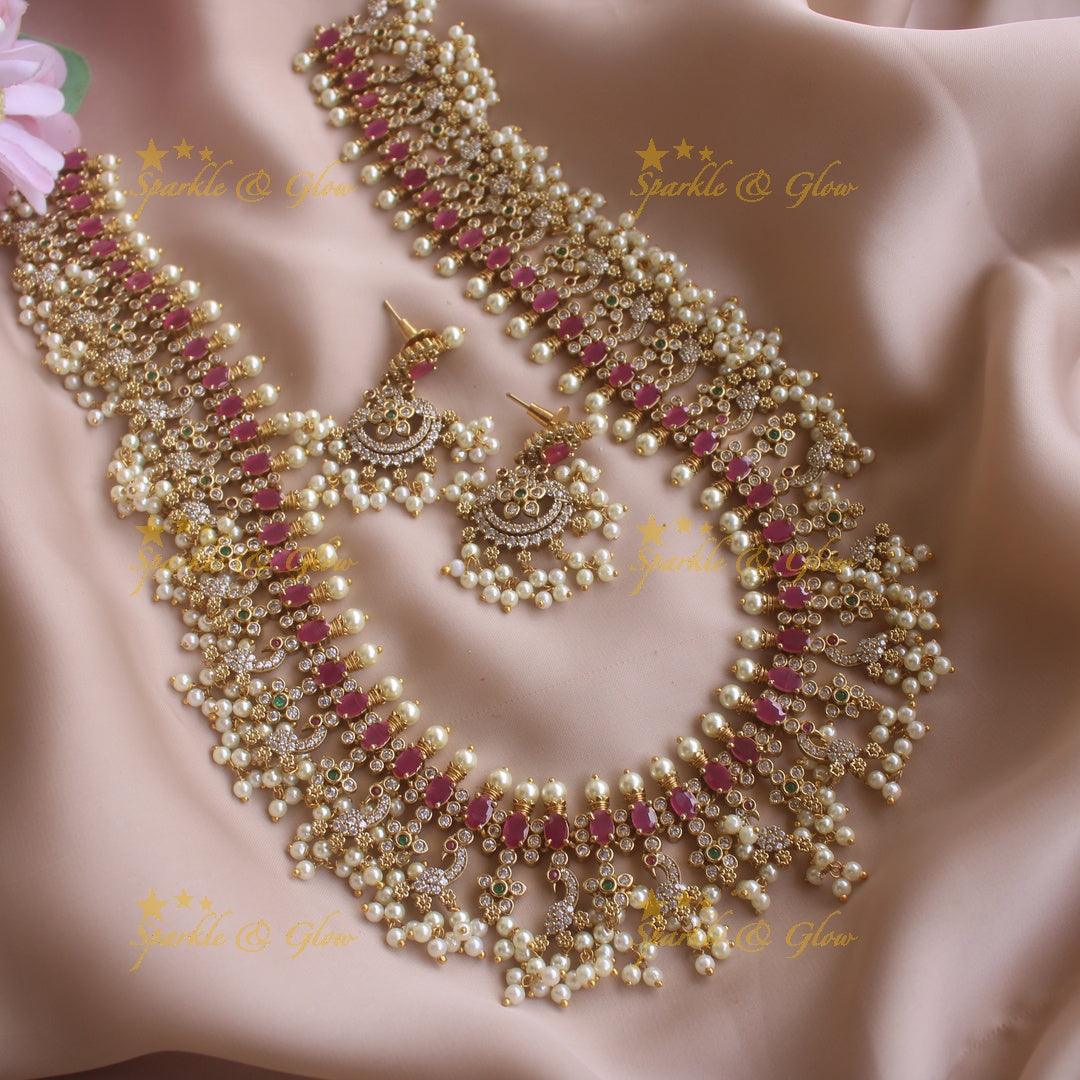 Gorgeous Peacock and floral gutta pusalu long necklace with ruby and CZ stones - Sparkle and Glow