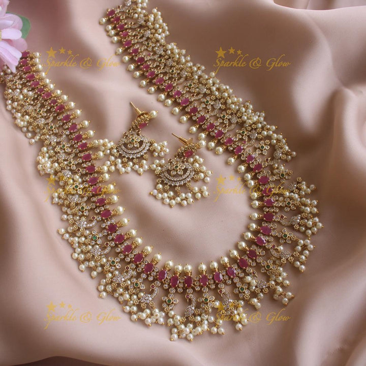 Gorgeous Peacock and floral gutta pusalu long necklace with ruby and CZ stones - Sparkle and Glow