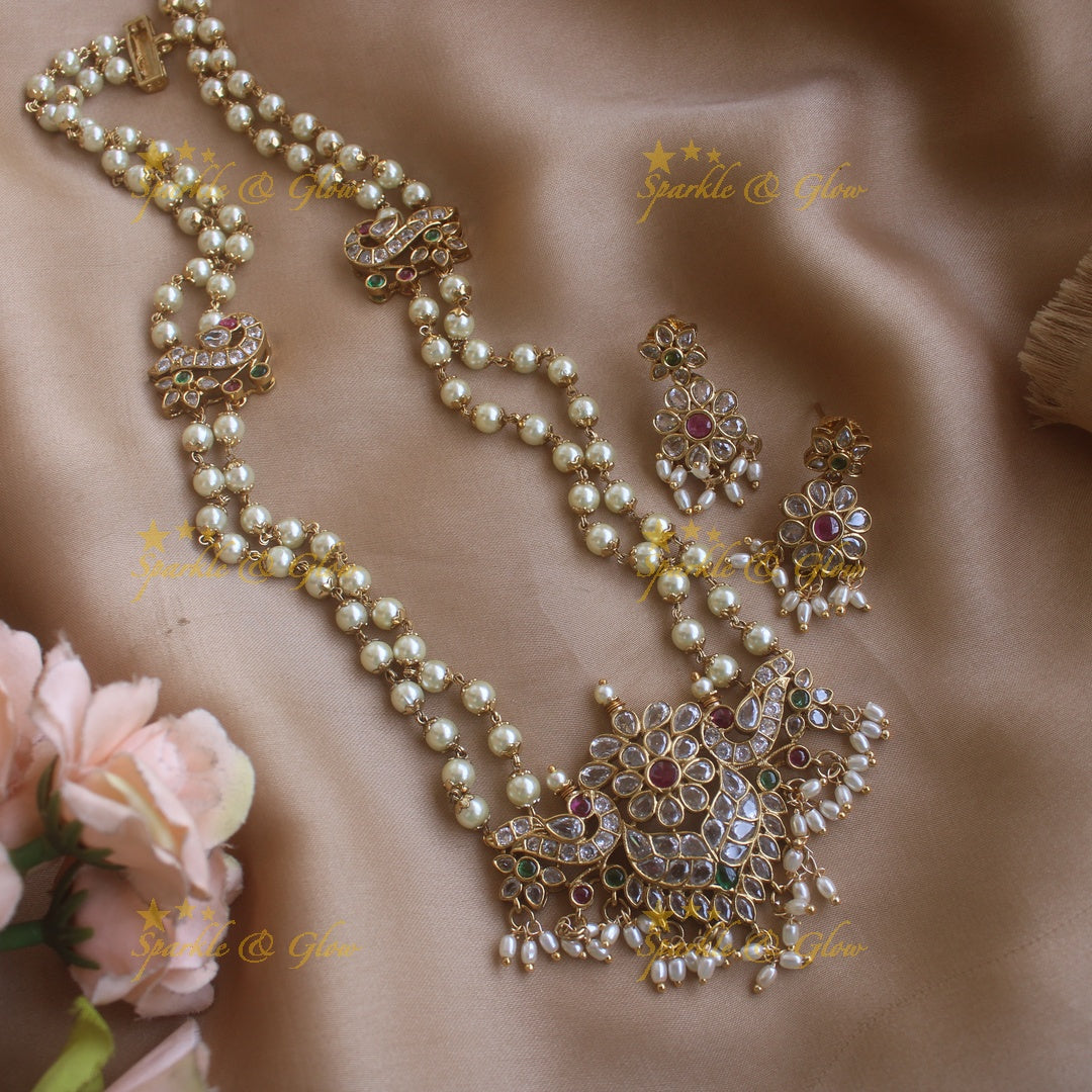 Beautiful Peacock and floral pendant haram with two layer pearl chain and CZ stones