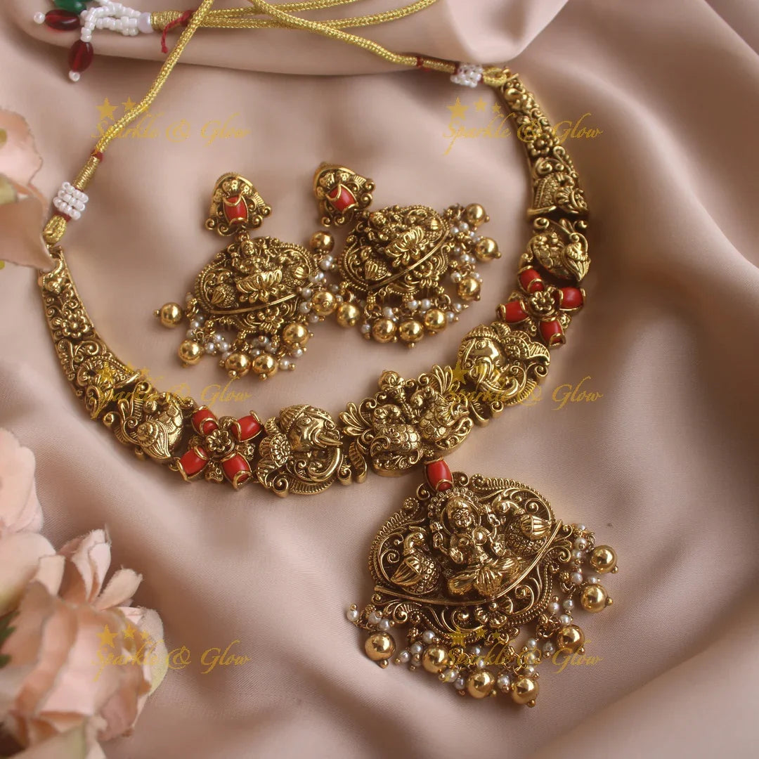 Beautiful Lakshmi elephant peacock carved short necklace with coral and gold beads - Sparkle and Glow