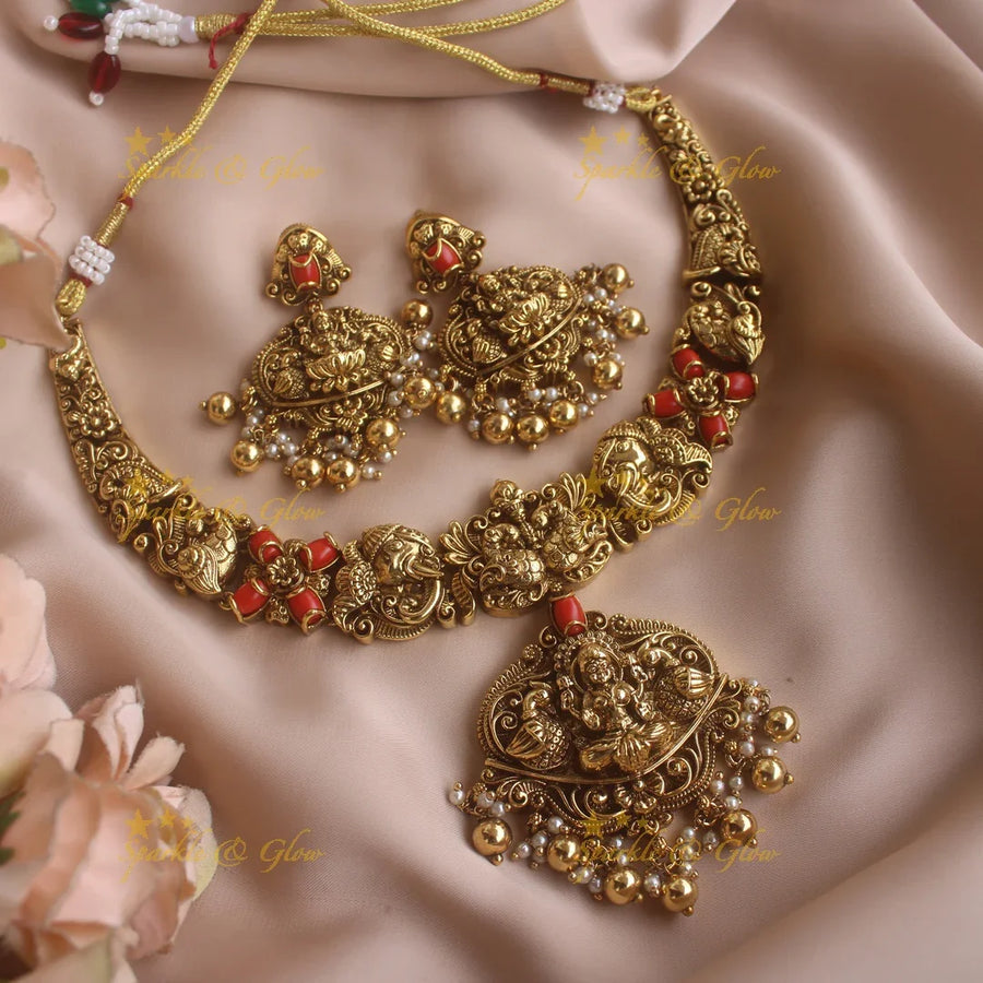 Beautiful Lakshmi elephant peacock carved short necklace with coral and gold beads - Sparkle and Glow