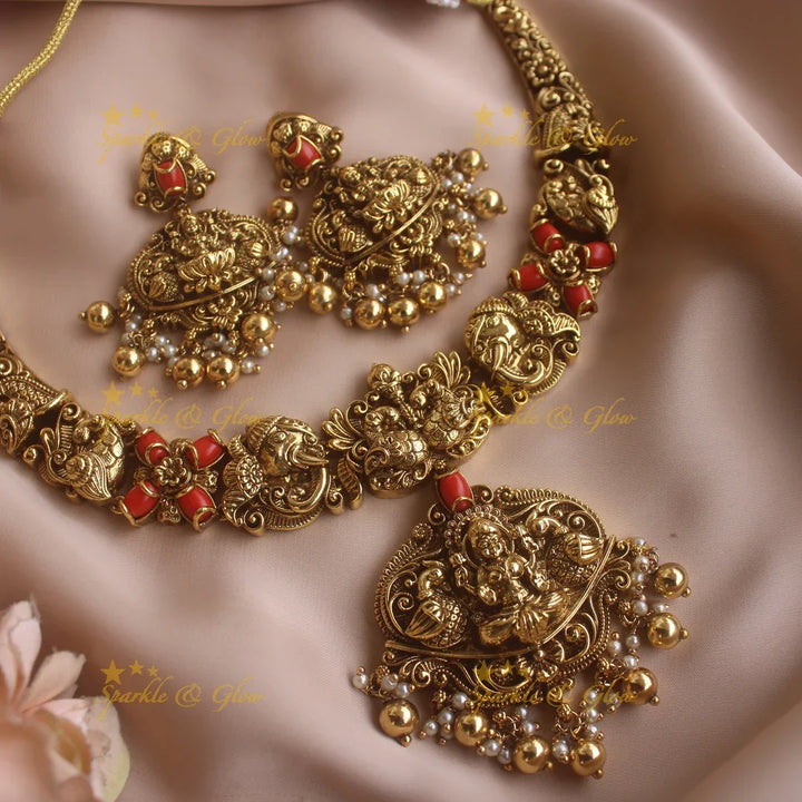 Beautiful Lakshmi elephant peacock carved short necklace with coral and gold beads - Sparkle and Glow