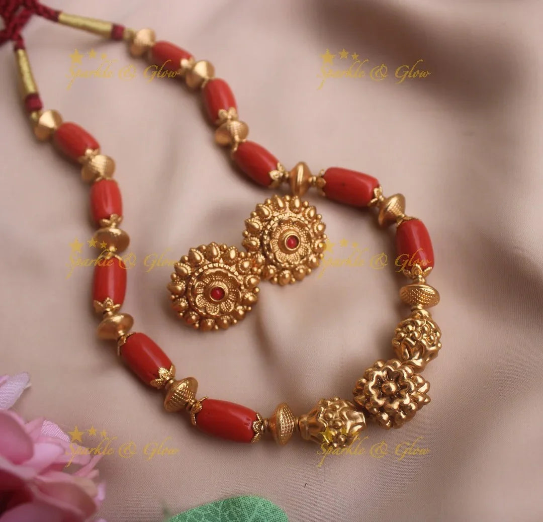 Intricately caved Coral and Gold beaded short necklace - Sparkle and Glow