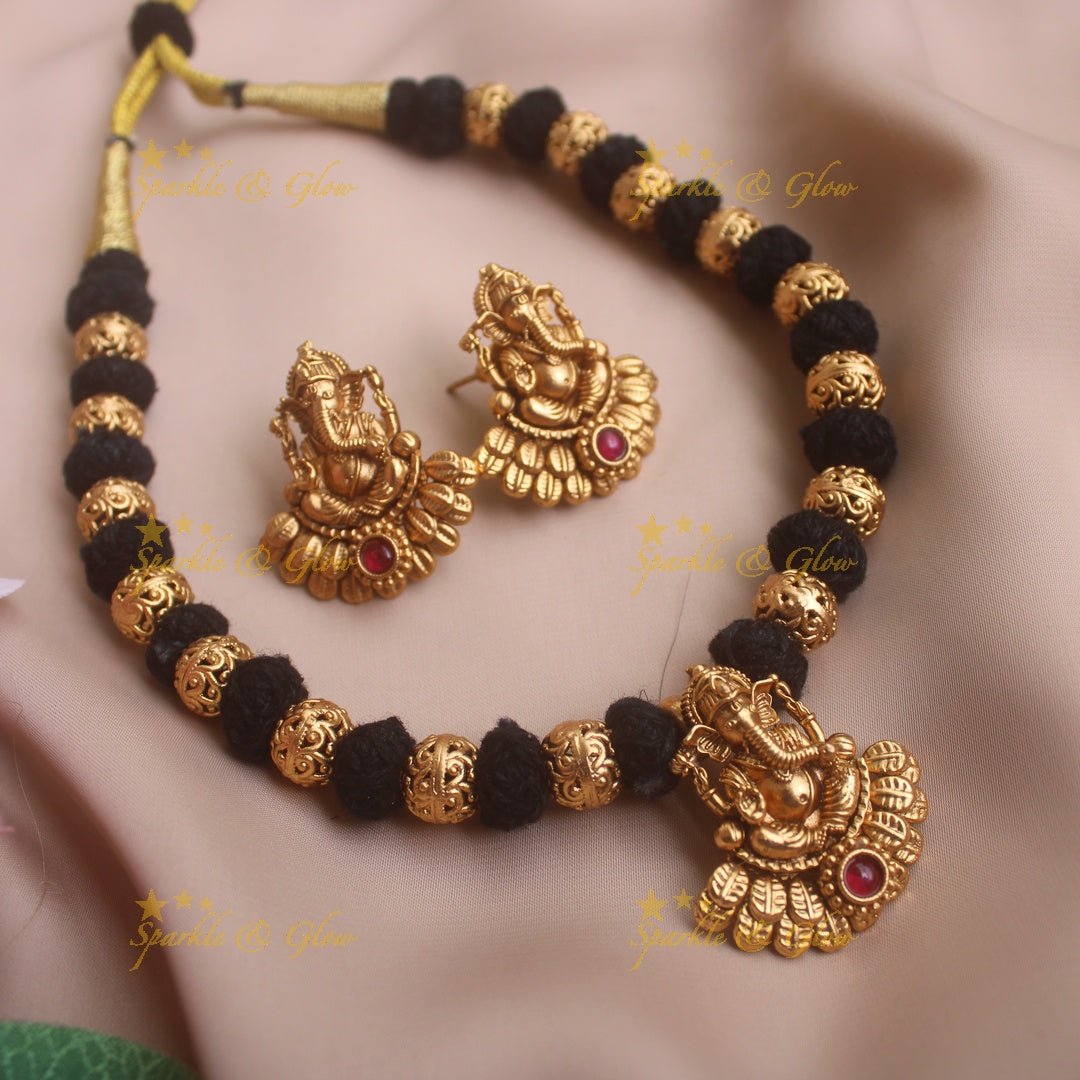 Idol Ganesha carved gold ball beaded thread necklace