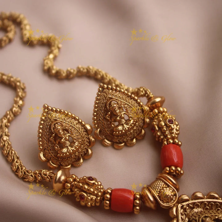 Idol Lakshmi pendant carved coral and gold ball beaded chain - Sparkle and Glow